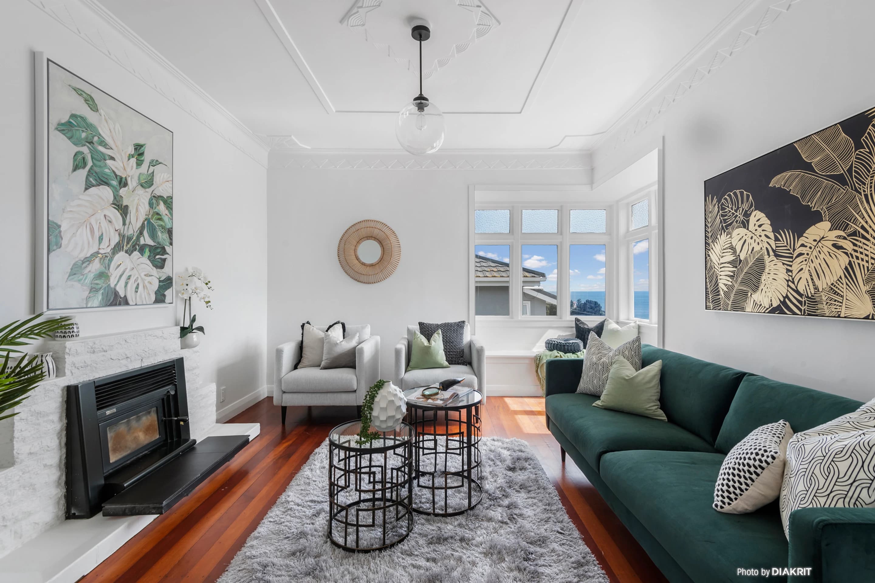 Modern living room with green sofa